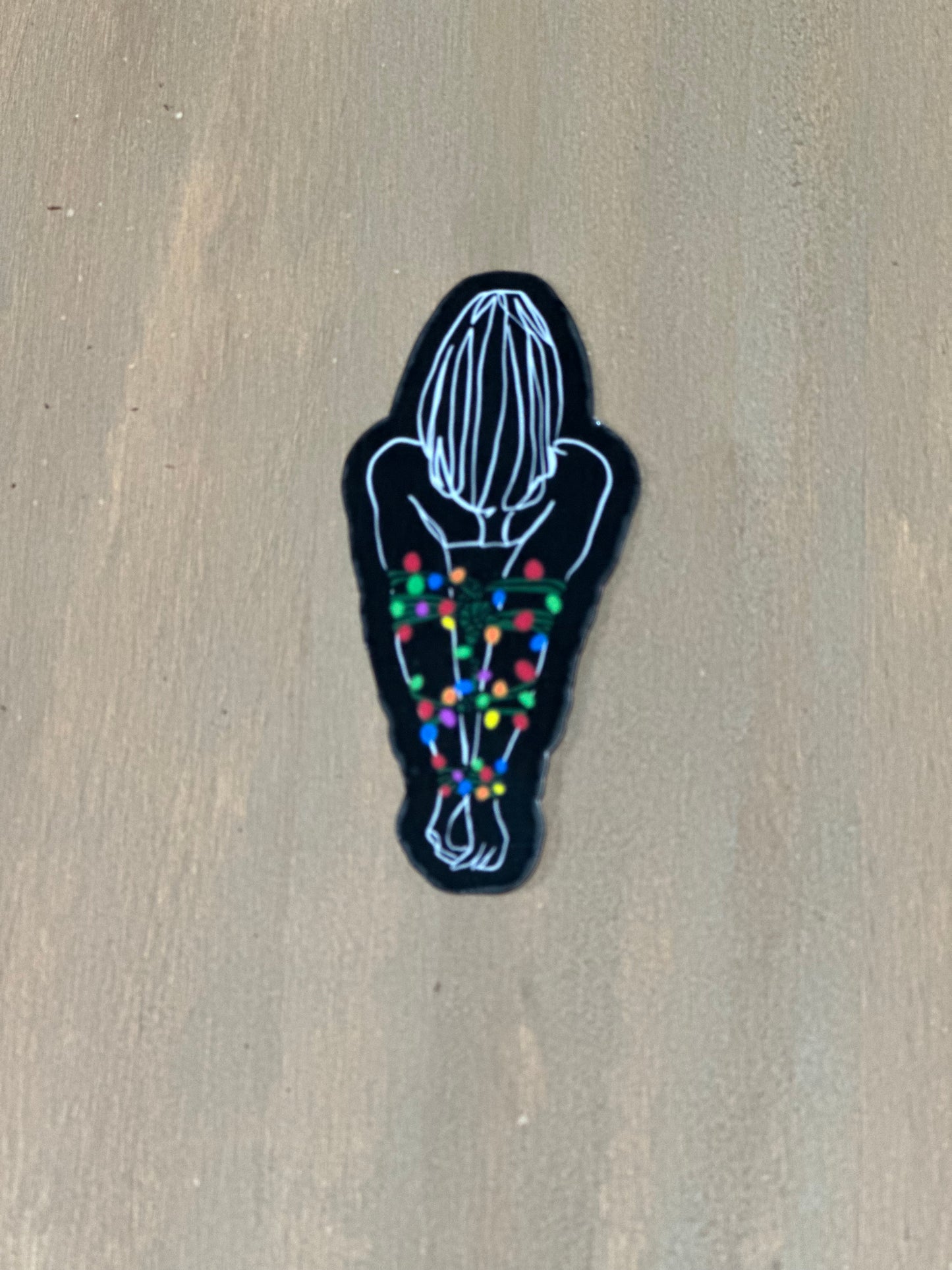 Tied up with Lights Sticker